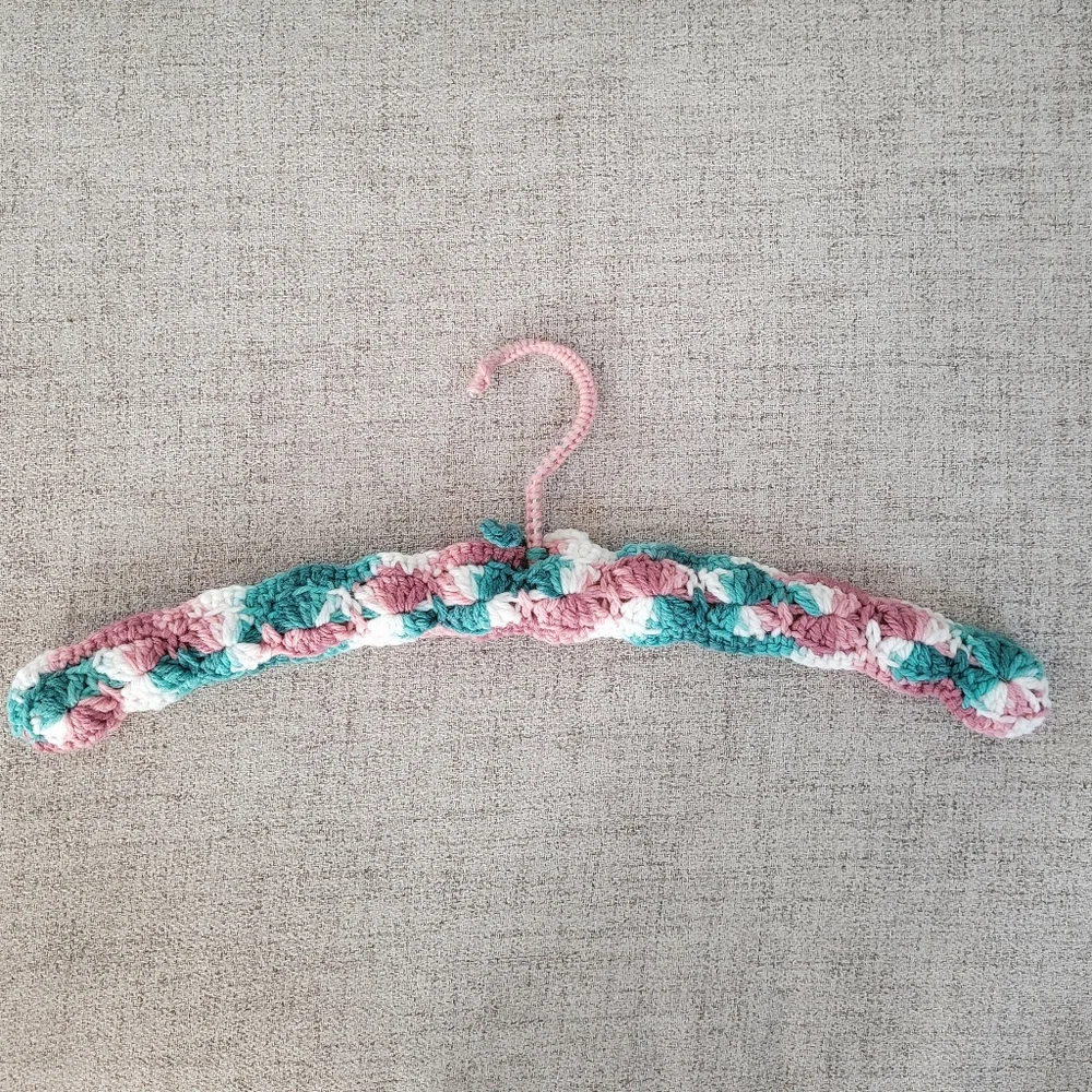 Vintage handmade knit clothing hanger
